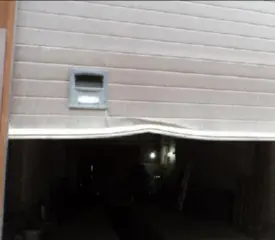 Выпрямление вмятин на гаражных воротах